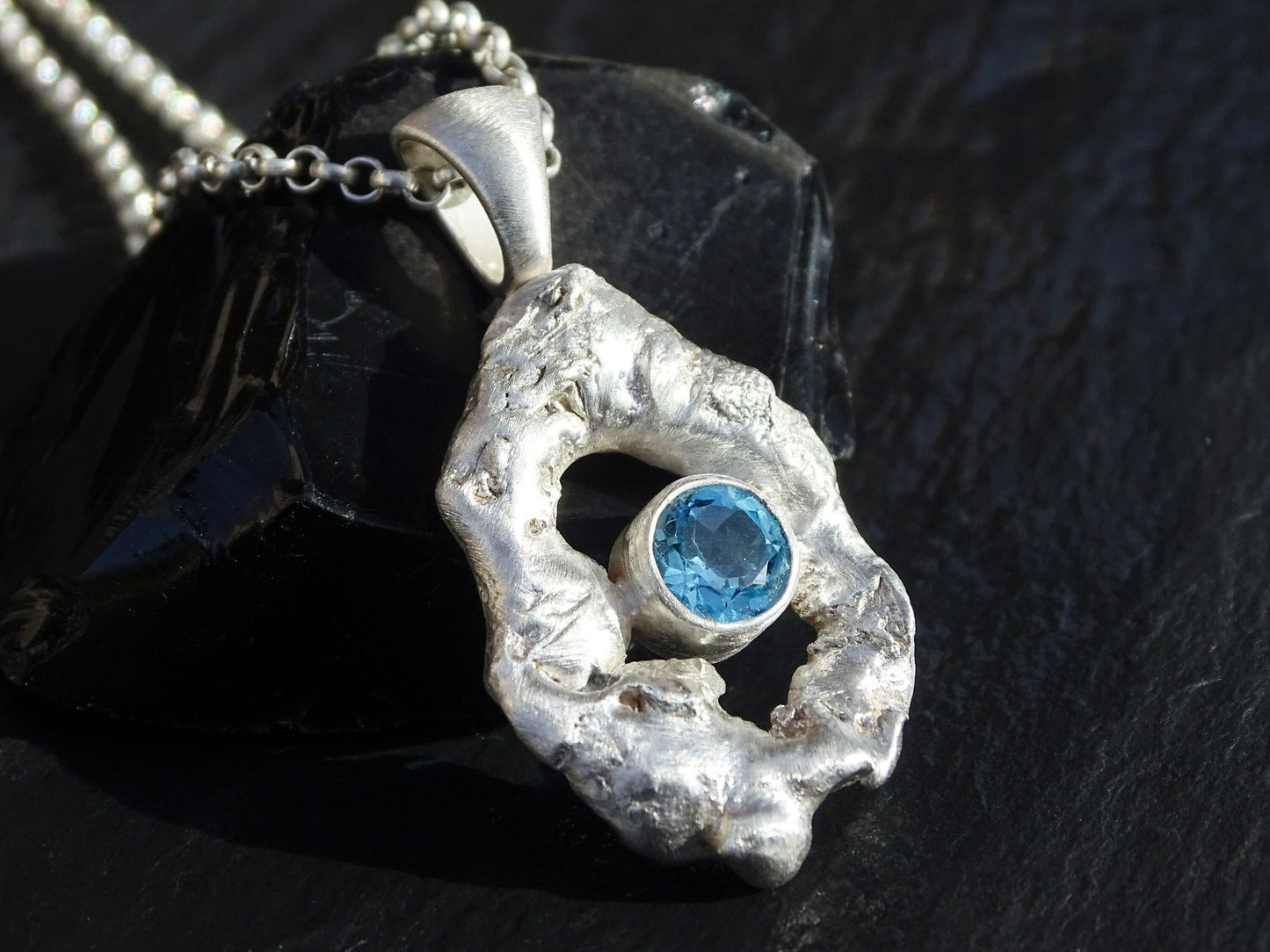 blue topaz pendant silver