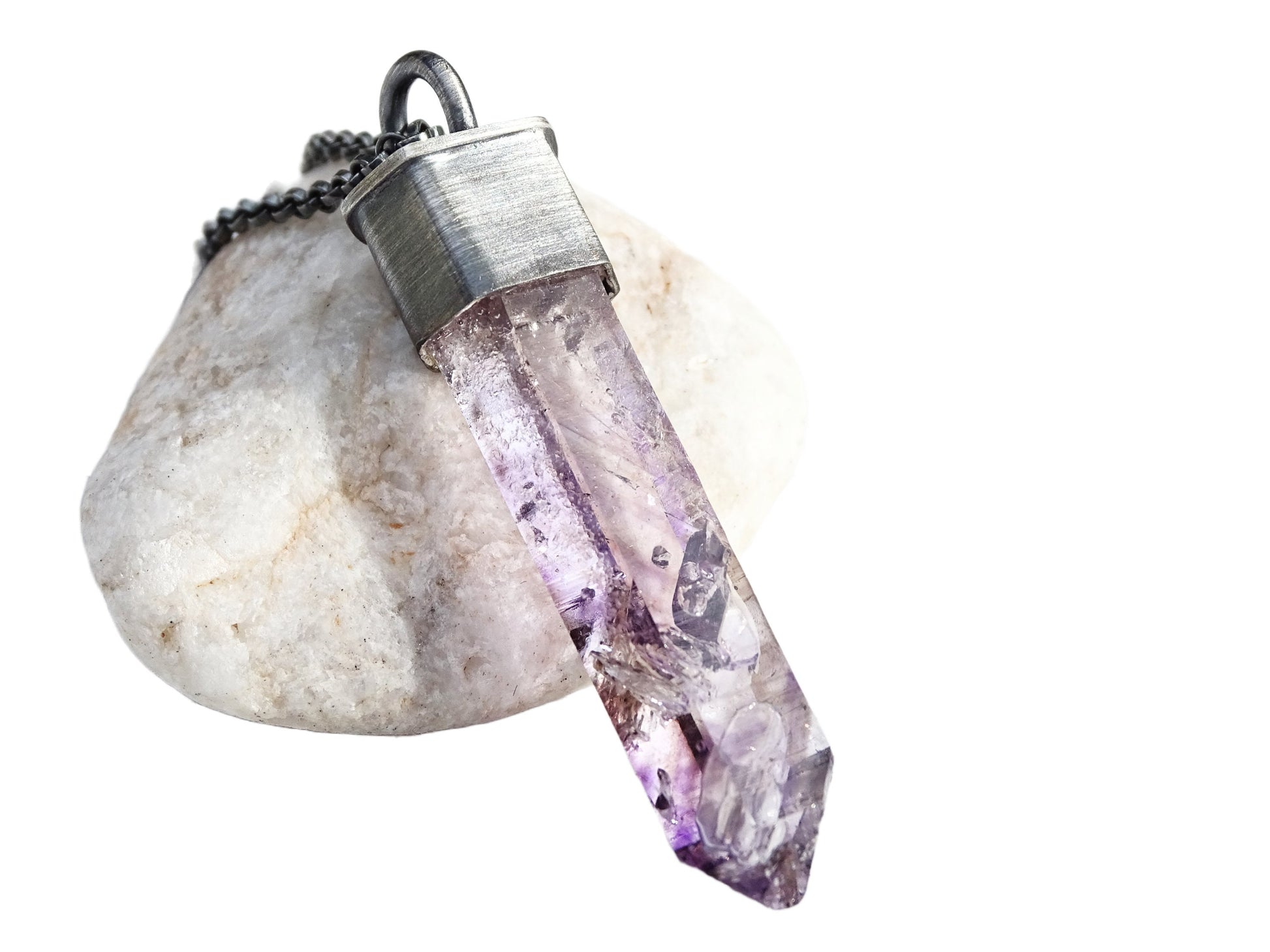 Uncut amethyst phantom crystal pendant, set in dark oxidized sterling silver. Amethyst is a February Birthstone and a traditional gift for your 4th, 6th and 17th ann